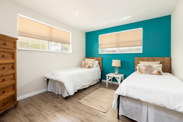 bedroom featuring hardwood / wood-style flooring