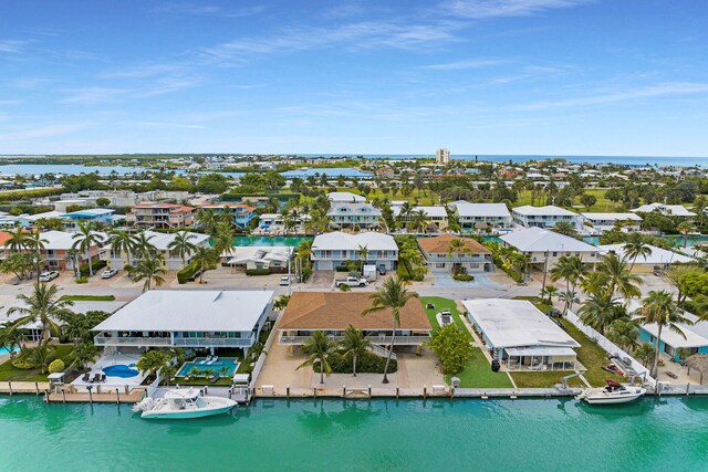511 9th St, Key Colony, FL 33051 - aerial perspective of suburban area featuring a large body of water