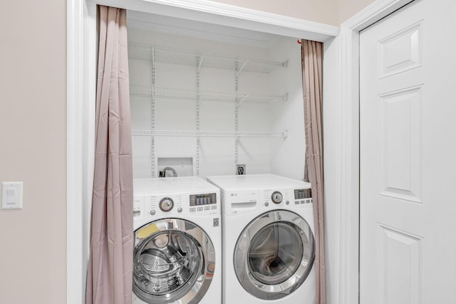 clothes washing area with independent washer and dryer