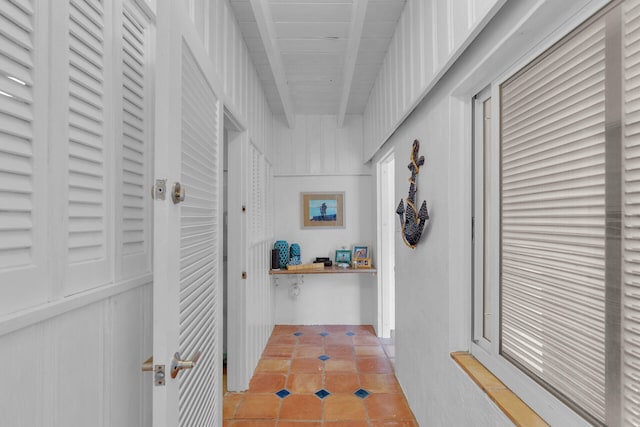 corridor featuring light tile patterned flooring