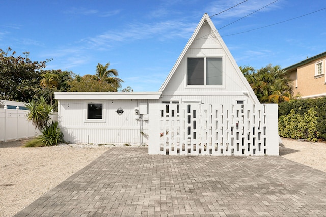 view of front of home with fence