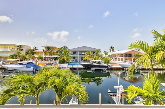 property view of water featuring a boat dock