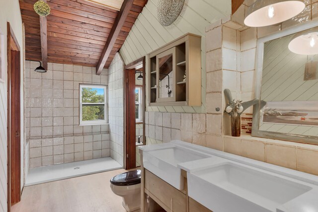 bathroom featuring lofted ceiling with beams, tile walls, wooden ceiling, vanity, and hardwood / wood-style floors