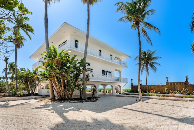 228 W Seaview Cir, Duck, FL 33050 - view of building exterior with a carport