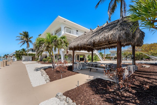 228 W Seaview Cir, Duck, FL 33050 - view of patio / terrace with a balcony