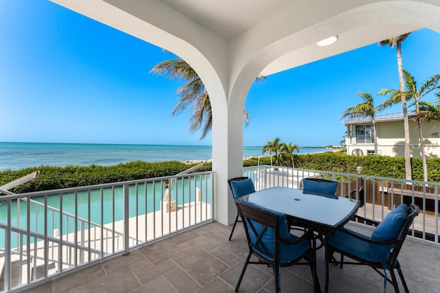 228 W Seaview Cir, Duck, FL 33050 - view of patio featuring a water view and outdoor dining space