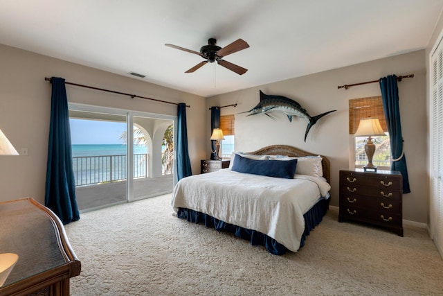 228 W Seaview Cir, Duck, FL 33050 - bedroom featuring access to outside, carpet floors, and multiple windows
