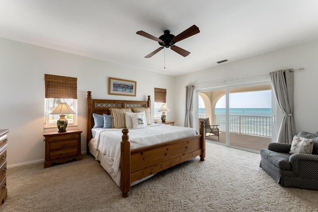 228 W Seaview Cir, Duck, FL 33050 - bedroom featuring access to outside, carpet flooring, a water view, a ceiling fan, and baseboards
