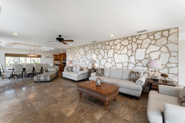 228 W Seaview Cir, Duck, FL 33050 - living room with stone tile floors, a ceiling fan, and recessed lighting