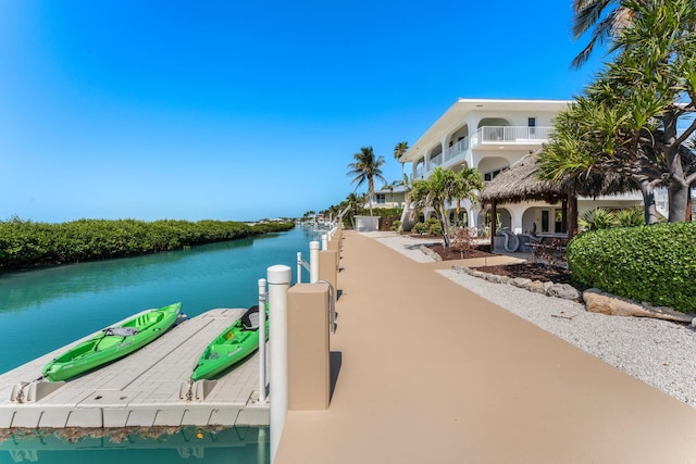 228 W Seaview Cir, Duck, FL 33050 - dock area with a water view and a balcony