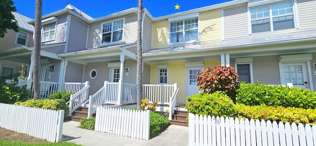 view of property with a porch