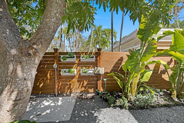 view of patio / terrace with fence and a gate