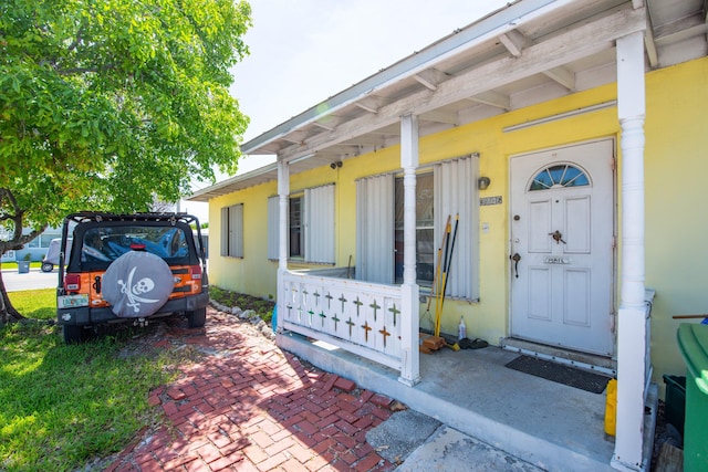 3746 Paula Ave, Key West, FL 33040 - view of exterior entry featuring a porch