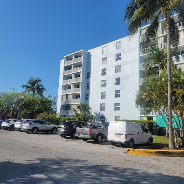 3312 Northside Dr Unit 407, Key West, FL 33040 - view of apartment building / complex featuring uncovered parking