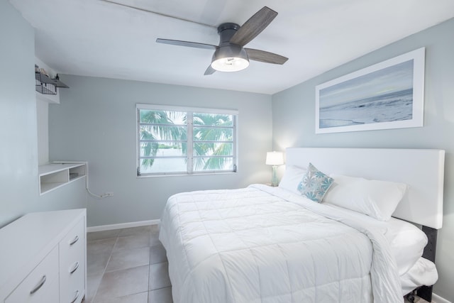 bedroom featuring light tile patterned floors and ceiling fan