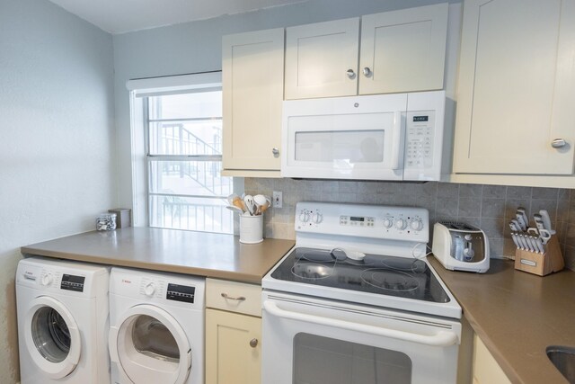 kitchen with white cabinetry, white appliances, washer and clothes dryer, and decorative backsplash