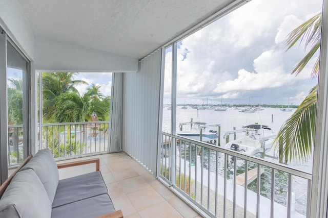 balcony featuring a water view