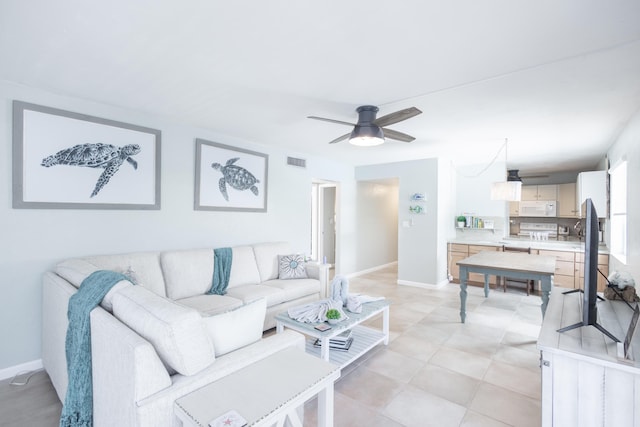 living room with ceiling fan