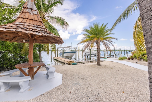 view of dock with a water view