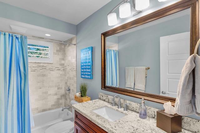 full bathroom featuring shower / bathtub combination with curtain, vanity, and toilet