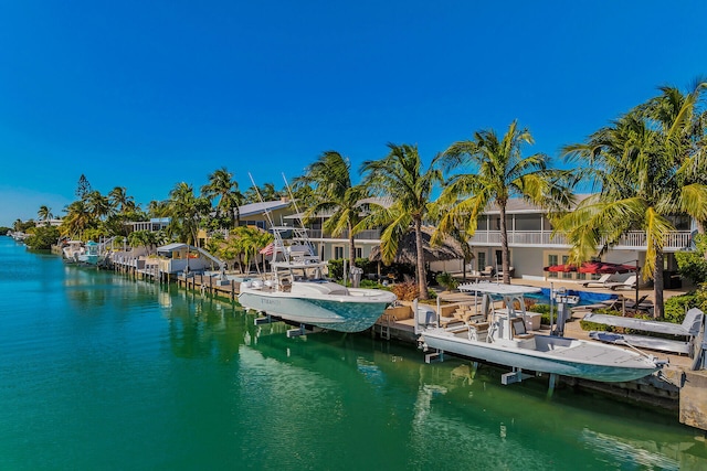 dock area featuring a water view and a lanai