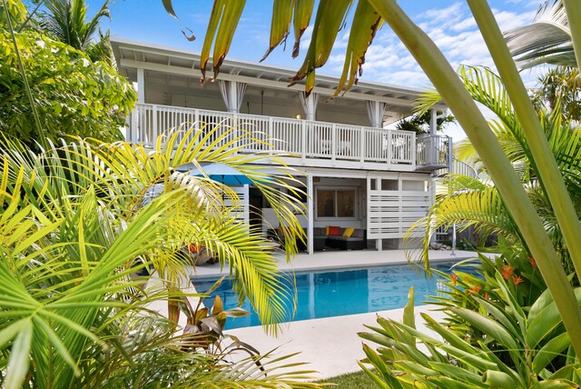 pool with a patio area