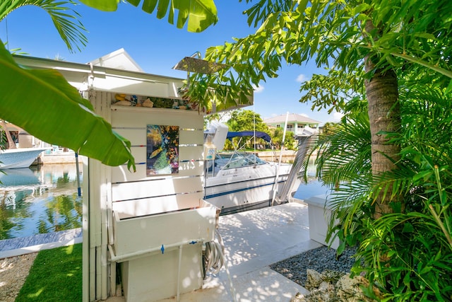 dock area with a water view