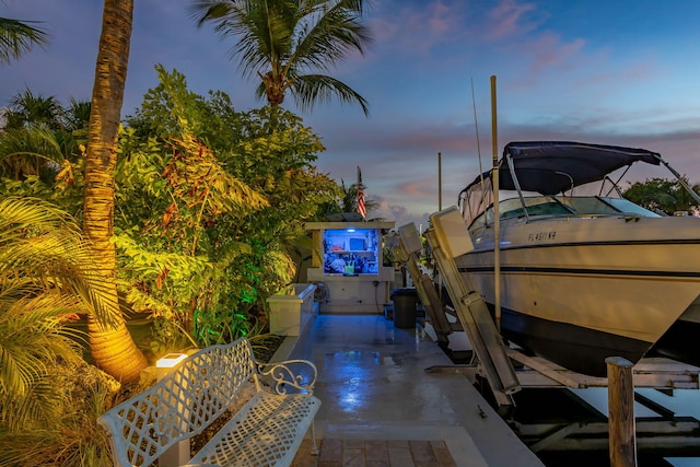 exterior space featuring a dock and boat lift