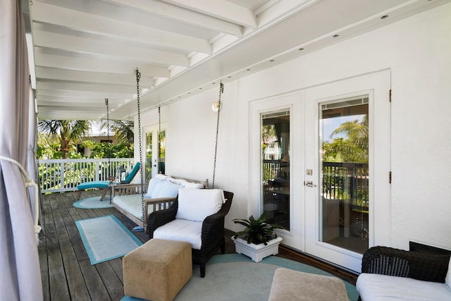 wooden deck featuring french doors