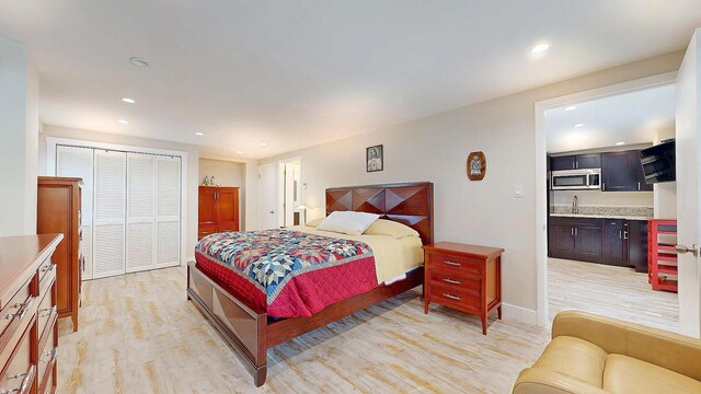 bedroom featuring light hardwood / wood-style floors