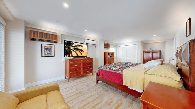 bedroom with light hardwood / wood-style flooring