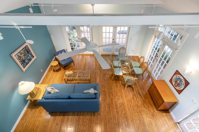 living room featuring hardwood / wood-style flooring and french doors