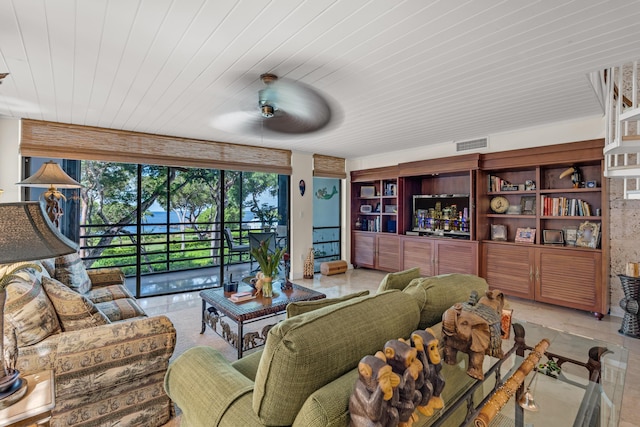 living room featuring ceiling fan, floor to ceiling windows, and wooden ceiling