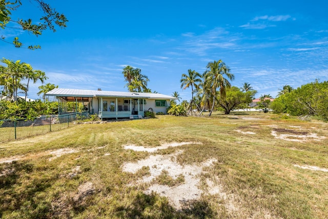 view of yard featuring covered porch