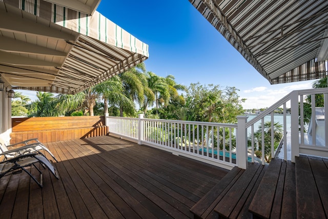 deck featuring a water view