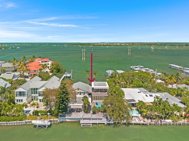 drone / aerial view featuring a water view