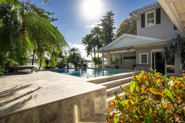 view of pool with a patio area