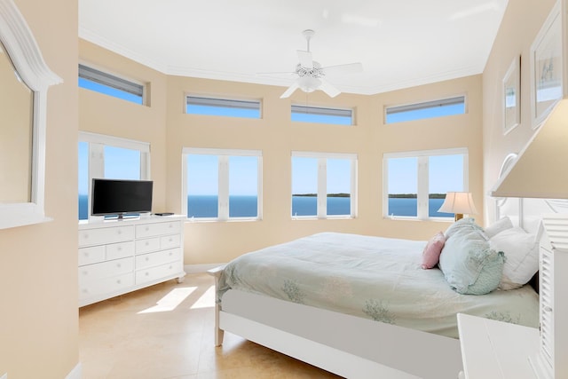 tiled bedroom with crown molding, a towering ceiling, and ceiling fan