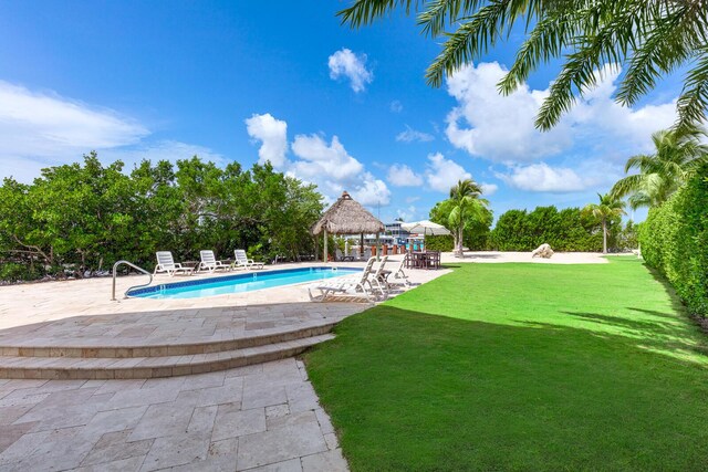 view of swimming pool with a gazebo, a yard, and a patio area