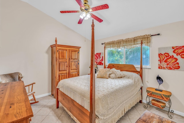 tiled bedroom featuring lofted ceiling and ceiling fan