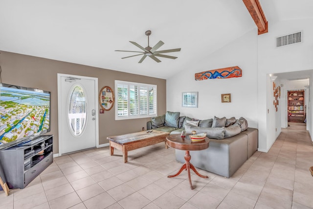 living room with beamed ceiling, high vaulted ceiling, light tile patterned floors, and ceiling fan