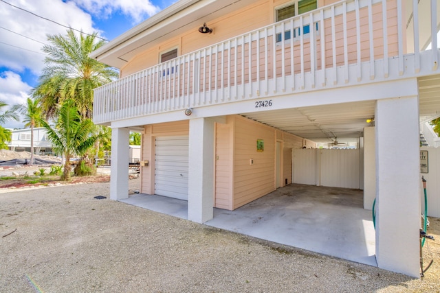 garage featuring a carport