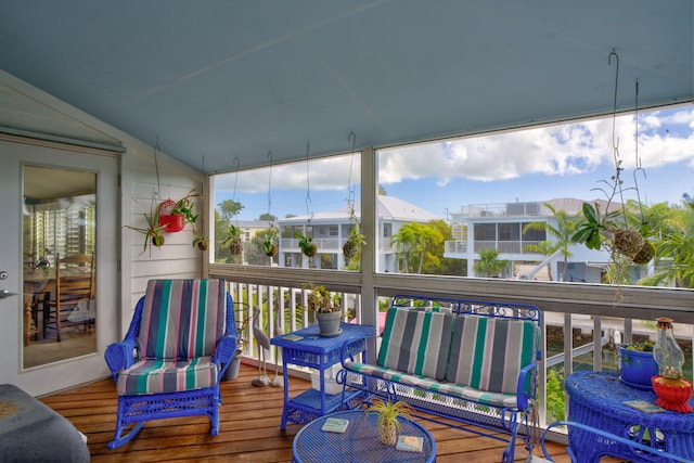 sunroom with lofted ceiling