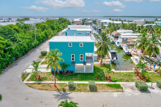 bird's eye view with a water view