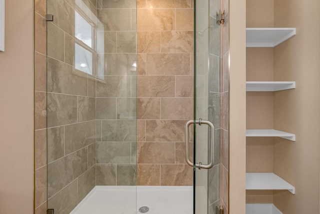 full bathroom featuring a stall shower