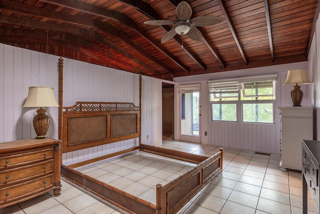 unfurnished bedroom featuring light tile patterned flooring, ceiling fan, wooden ceiling, and vaulted ceiling with beams