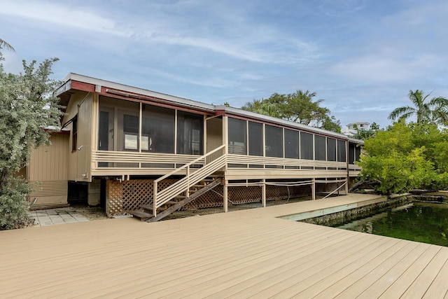 exterior space featuring a sunroom