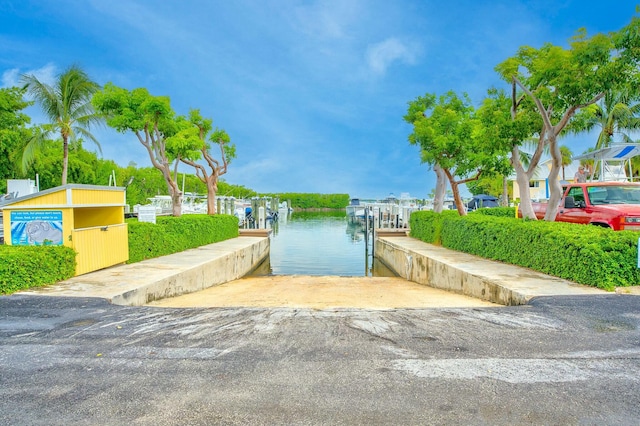 dock area with a water view