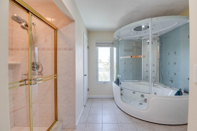 bathroom with tile patterned flooring and separate shower and tub