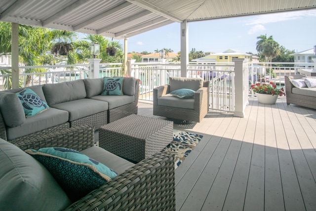 wooden deck with an outdoor hangout area